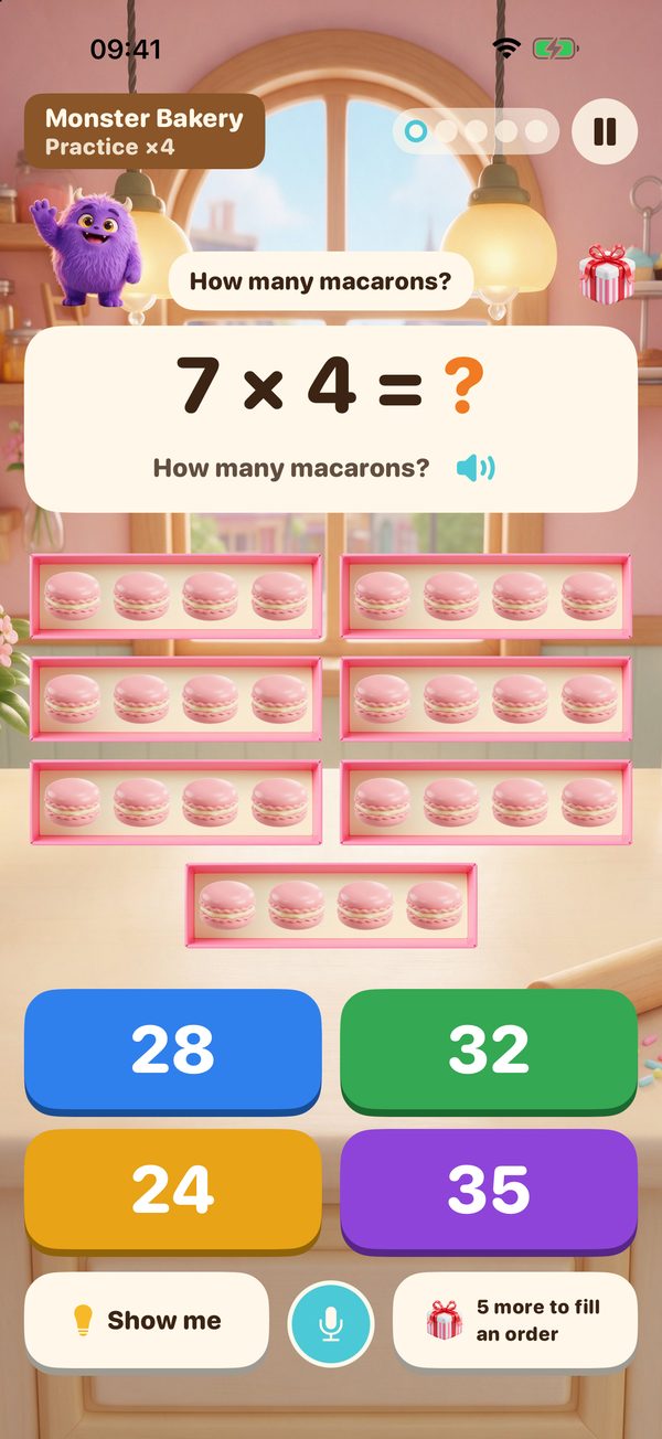 A question in Monster Bakery: 7 × 4 shown as seven trays of four macarons, with four answers to choose from